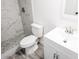 Modern bathroom with white vanity, toilet and shower at 6952 Sw 85Th Pl, Ocala, FL 34476