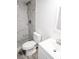 Clean bathroom, featuring a shower and white vanity at 6952 Sw 85Th Pl, Ocala, FL 34476