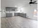 Modern gray kitchen with new appliances and flooring at 6952 Sw 85Th Pl, Ocala, FL 34476