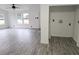 Open living room with vinyl plank flooring and ceiling fan at 6952 Sw 85Th Pl, Ocala, FL 34476