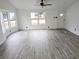 Living room with vinyl flooring and lots of natural light at 6952 Sw 85Th Pl, Ocala, FL 34476