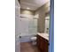 Clean bathroom with tub, shower, and vanity at 8276 Maritime Flag St # 201, Windermere, FL 34786