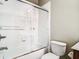 Clean bathroom with shower/tub combo and white tile at 8276 Maritime Flag St # 201, Windermere, FL 34786