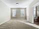 Spacious bedroom with neutral walls and carpeting at 8276 Maritime Flag St # 201, Windermere, FL 34786