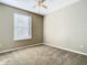 Bright bedroom with neutral walls and carpet at 8276 Maritime Flag St # 201, Windermere, FL 34786