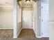 Apartment entryway with tiled floor and neutral color palette at 8276 Maritime Flag St # 201, Windermere, FL 34786