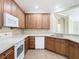 Well-equipped kitchen, featuring ample wood cabinetry at 8276 Maritime Flag St # 201, Windermere, FL 34786