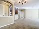 Spacious living room with neutral carpeting and an open floor plan at 8276 Maritime Flag St # 201, Windermere, FL 34786