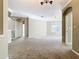 Bright living room with large windows and access to a balcony at 8276 Maritime Flag St # 201, Windermere, FL 34786