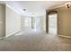 Living room with access to a balcony and neutral color scheme at 8276 Maritime Flag St # 201, Windermere, FL 34786