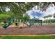 playground with playset, gazebo, and ample green space at 8276 Maritime Flag St # 201, Windermere, FL 34786