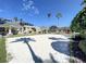 Sand volleyball court with covered seating areas nearby at 8276 Maritime Flag St # 201, Windermere, FL 34786