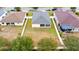 Aerial view of house and surrounding homes at 841 Greenshank Dr, Haines City, FL 33844