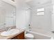 Clean bathroom with a shower/tub combo and a vanity with a mirror at 841 Greenshank Dr, Haines City, FL 33844