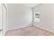 Bright bedroom with neutral walls and carpet at 841 Greenshank Dr, Haines City, FL 33844