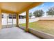 Screened patio overlooking backyard at 841 Greenshank Dr, Haines City, FL 33844