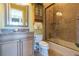 Bathroom boasts granite vanity, large mirror, and a shower/tub combo at 9213 Foxhall Ct, Orlando, FL 32819