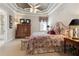 Cozy bedroom with antique dresser and floral bedding at 9213 Foxhall Ct, Orlando, FL 32819