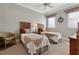 Bedroom with two twin beds and neutral decor at 9213 Foxhall Ct, Orlando, FL 32819