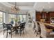 Breakfast nook with a round table and chairs, adjacent to the kitchen at 9213 Foxhall Ct, Orlando, FL 32819