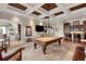 Spacious game room, featuring a pool table and wet bar at 9213 Foxhall Ct, Orlando, FL 32819