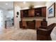 Home office with built-in cabinetry and workspace at 9213 Foxhall Ct, Orlando, FL 32819