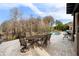 Outdoor dining area overlooking the pool and lush landscape at 9213 Foxhall Ct, Orlando, FL 32819