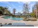 Stunning pool and spa with a picturesque lake view at 9213 Foxhall Ct, Orlando, FL 32819