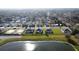 Aerial view of a house nestled in a quiet neighborhood, near a lake at 925 Magnolia Ave, Holly Hill, FL 32117