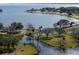 Aerial view of waterfront park with walking paths and bridges at 9556 Starling Loop, Leesburg, FL 34788