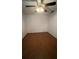 Bright bedroom with ceiling fan and hardwood floors at 10 Moree Loop # 1, Winter Springs, FL 32708