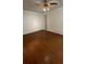 Bedroom with ceiling fan and wood-look flooring at 10 Moree Loop # 1, Winter Springs, FL 32708