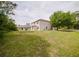 An expansive backyard offers ample space for recreation and relaxation at 1010 Embrun Ct, Kissimmee, FL 34759