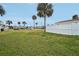 Front yard with grassy area and white fence at 106 Cardinal Dr # D, Ormond Beach, FL 32176