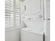 Stackable washer and dryer in a convenient laundry closet at 106 Cardinal Dr # D, Ormond Beach, FL 32176