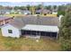 House with a screened patio, viewed from above at 1062 Blue Horizon Dr, Deltona, FL 32725