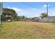 Large backyard with grassy area and trees at 1062 Blue Horizon Dr, Deltona, FL 32725