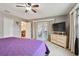 Main bedroom with French doors leading to a patio at 1062 Blue Horizon Dr, Deltona, FL 32725