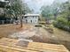 Backyard with wooden deck and mature trees at 113 W 19Th St, Sanford, FL 32771