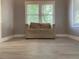 Serene bedroom with neutral walls and large windows at 113 W 19Th St, Sanford, FL 32771