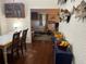 Dining room with hardwood floors and view into the living room at 113 W 19Th St, Sanford, FL 32771