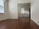 Empty dining room with hardwood floors and white walls at 113 W 19Th St, Sanford, FL 32771