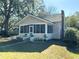 Charming bungalow with screened porch and landscaped yard at 113 W 19Th St, Sanford, FL 32771