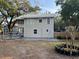 Updated two-story house with a metal roof and fenced backyard at 113 W 19Th St, Sanford, FL 32771