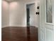 Open doorway shows hardwood floors and a view into the next room at 113 W 19Th St, Sanford, FL 32771