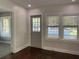 Bright living room with hardwood floors and access to backyard at 113 W 19Th St, Sanford, FL 32771