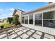 Stone patio adjacent to the house, providing extra outdoor space at 1234 Villa Ln # 142, Apopka, FL 32712