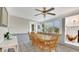 Bright dining room with wood table and fireplace at 1296 W Wellington Dr, Deltona, FL 32725