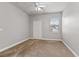 Well-lit bedroom with neutral decor and carpet at 130 Southern Pecan Cir # 102, Winter Garden, FL 34787