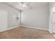 Spacious bedroom with neutral walls and carpeting at 130 Southern Pecan Cir # 102, Winter Garden, FL 34787